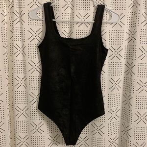 Abercrombie & Fitch black crackle thong bodysuit.